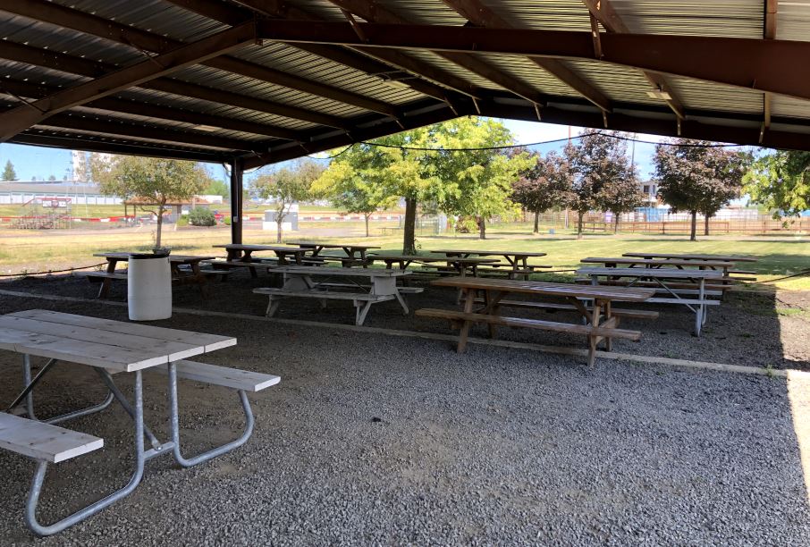 Picnic tables under covering outside